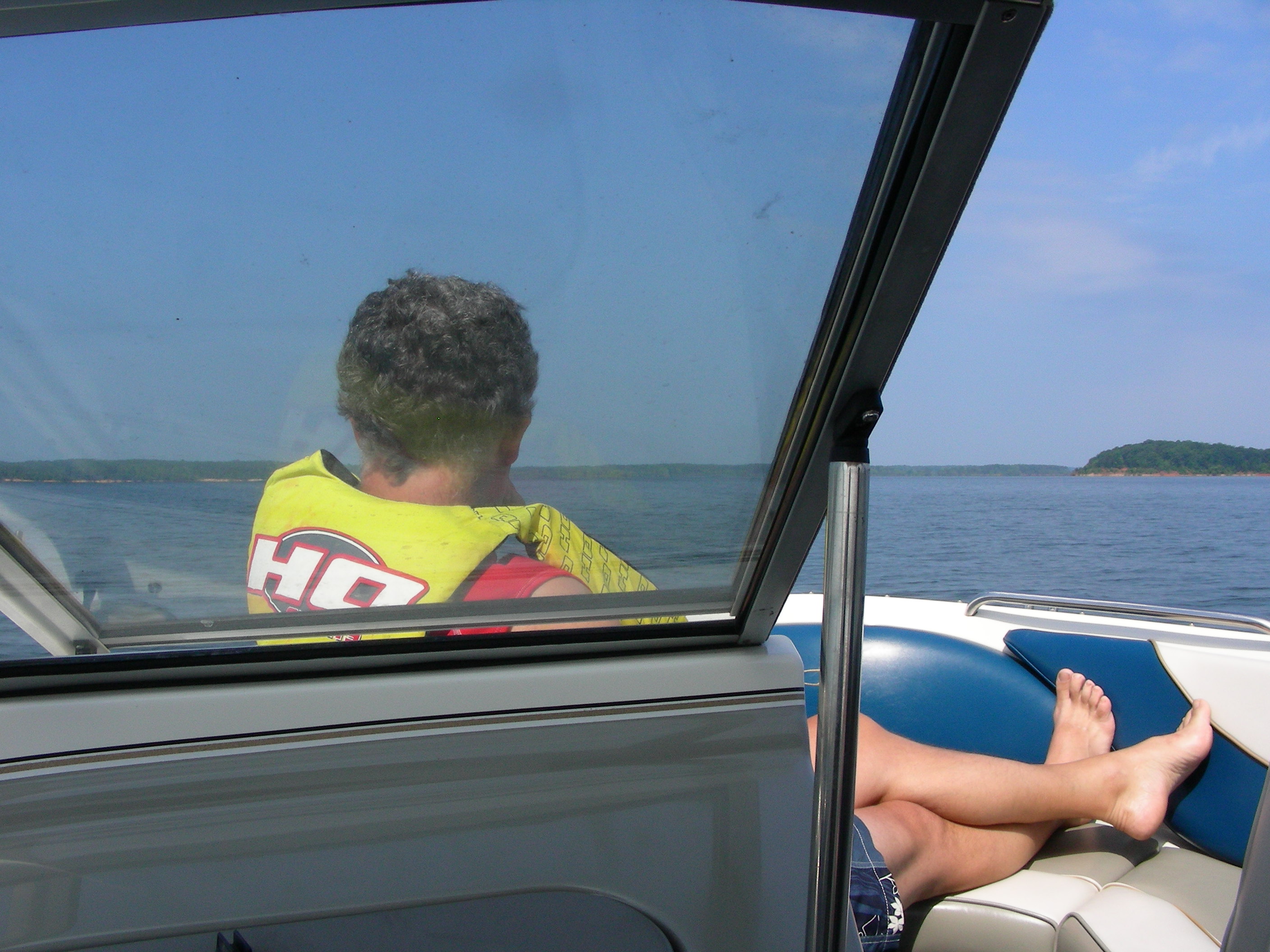 ./2010/Kerr Lake/Luis boating w guys 0003.JPG